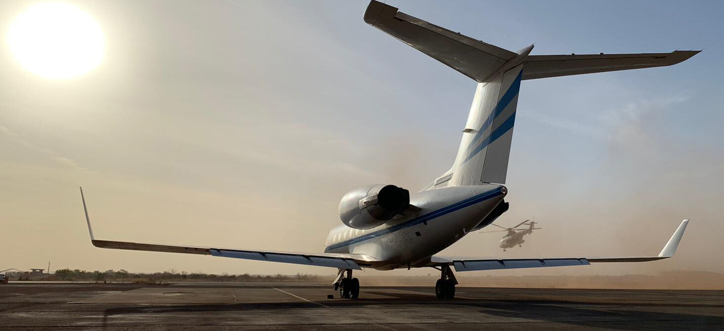 Tail view of a private jet on a runway